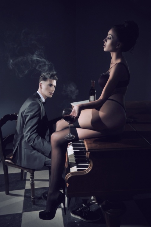 Sexy couple with piano